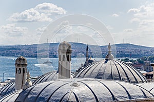Istanbul, Turkey. Dome of the Suleymaniye Mosque complex of buildings (1557) against the backdrop of the Bosphorus
