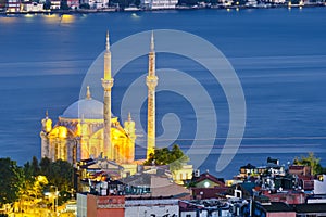 Istanbul, Turkey, July 12, 2021. Ortakoy wharf, ships on the Bosporus. Night city view, Ortakoy Mosque, Bosphorus, and