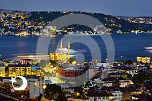 Istanbul, Turkey, July 12, 2021. Ortakoy wharf, ships on the Bosporus. Night city view, Ortakoy Mosque, Bosphorus, and