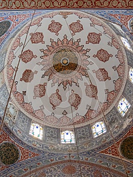 ISTANBUL, TURKEY - MAY, 21, 2019: interior shot of the main dome of the blue mosque in istanbul