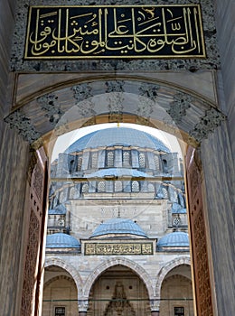 Istanbul, Turkey. 09-November-2018. Beautiful front view of main dome of Suleymaniye mosque from entrance and inscription above