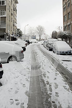 Istanbul winter season moda street is in snow. Cold day in Istanbul. photo