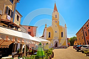 Istria. Town of Brtonigla church and square street view