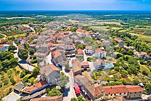 Istria. Town of Visnjan on green istrian hill aerial view