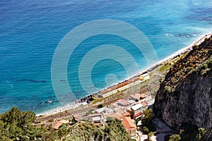 Aerial breathtaking view of Giardini Naxos railway station, shore of Ionian sea