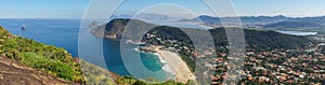 Itacoatiara Beach and town as seen from the mountain lookout in Niteroi, Brazil. photo