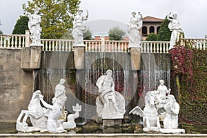 Itailian garden with sculptures and waterfall