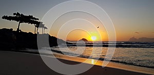 Itaipu beach on the sunset photo