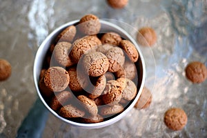 Italian amaretti bisquits on a glass backdrop