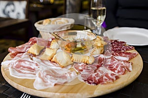 Italian antipasti on table photo
