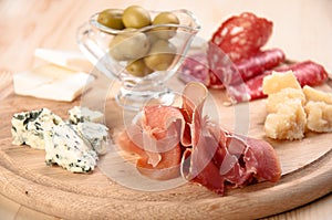 Italian antipasto with ham, olive, cheese