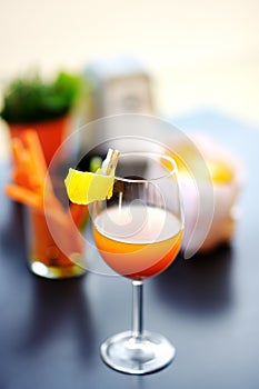 Italian aperitives/aperitif: glass of cocktail sparkling wine with Aperol and appetizer platter on the table