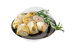 Italian appetizer Artichoke hearts pickled in olive oil with herbs and spices Isolated on white background. Top view.