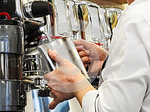 Italian Barista Crafting Cappuccino photo