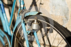 Italian blue bicicle with old dynamo