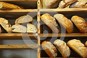 Italian bread on wooden shelves