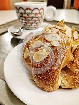 italian breakfast: details of a broche photo