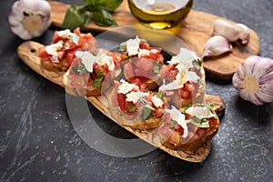 Italian bruschetta bread with tomato, basil and mozzarella cheese