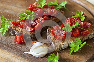 Italian bruschetta with cherry tomatoes on whole grain bread