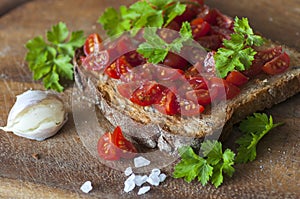 Italian bruschetta with cherry tomatoes on whole grain bread