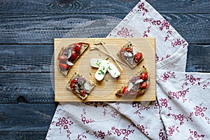 Italian bruschetta made with toasted slices of bread with cherry