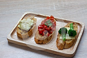 Italian bruschetta with mozzarella cheese,basil