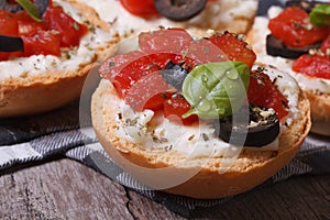 Italian bruschetta with tomatoes, feta cheese and olives