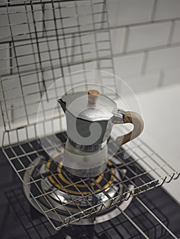 Italian caffettiera coffee pot on stove photo