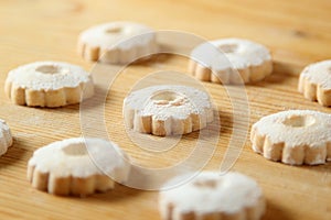 Italian canestrelli cookies on a wooden table