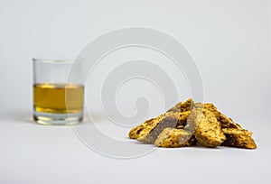 Italian cantucci and vin santo, isolated on white background