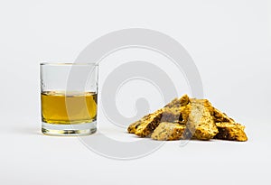 Italian cantucci and vin santo, on white background
