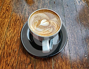 Italian cappuccino coffee with heart shape decorated froth