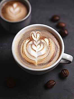 italian cappuccino with two lovebirds kissing in dark mood