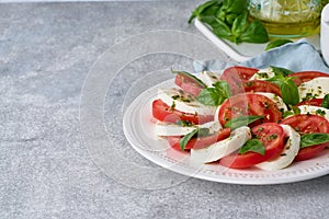 Italian caprese salad. Served mediterranean meal. Detox healthy antipasto. Copy space, side view