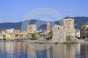 Italian castles on sea italian flag - castle of Rapallo , Liguria Genoa Tigullio gulf near Portofino Italy .