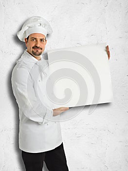 Italian chef showing the menu