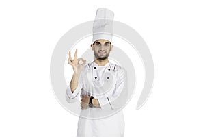 Italian chef showing OK sign on studio