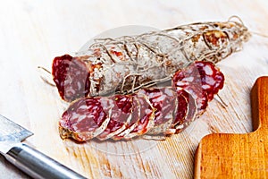 Italian coarse-grained salami piacentino photo