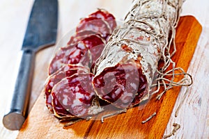 Italian coarse-grained salami piacentino photo