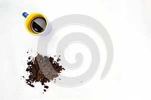 Italian coffee cup on white background with coffee grounds