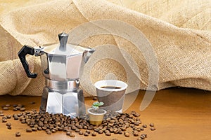 Italian coffee maker , recyclable cup and plant in coffee capsule