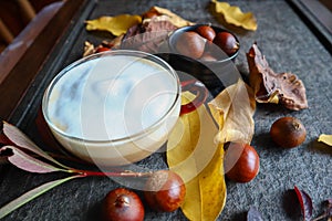 Italian coffee with milk in autumn style