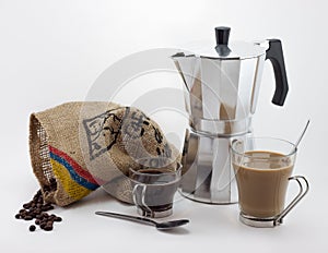 Italian cooffe maker, colombian coffee and cup of latte coffee photo