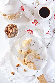 Italian cookie: almonds Canistrelli and cup of coffee