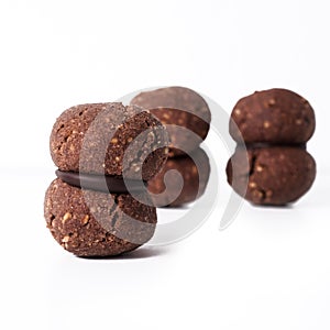 Italian cookies called baci di dama made with nuts and chocolate