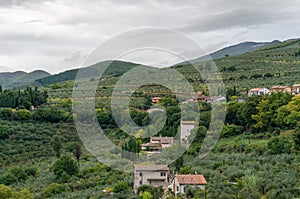 Italian countryside landscape with residential houses and farmland