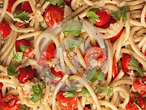 Italian crab and cherry tomato spaghetti pasta food background