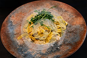 Italian cuisine, tagliatelle pasta with shrimps and cheese, restaurant dish, gourmet food plate