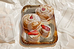 Italian dessert Zeppole di San Giuseppe, zeppola baked puffs made from choux pastry photo