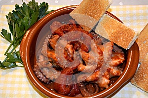 Italian dish octopus luciana with tomato fish traditional food photo